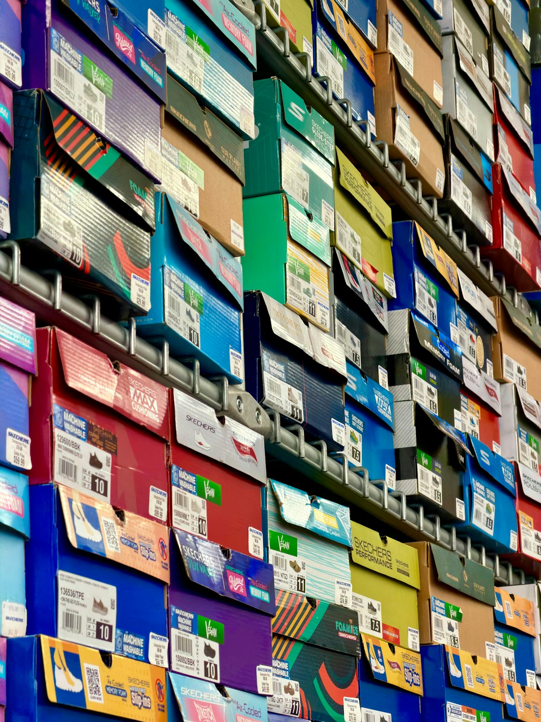Branded shoe boxes stacked high